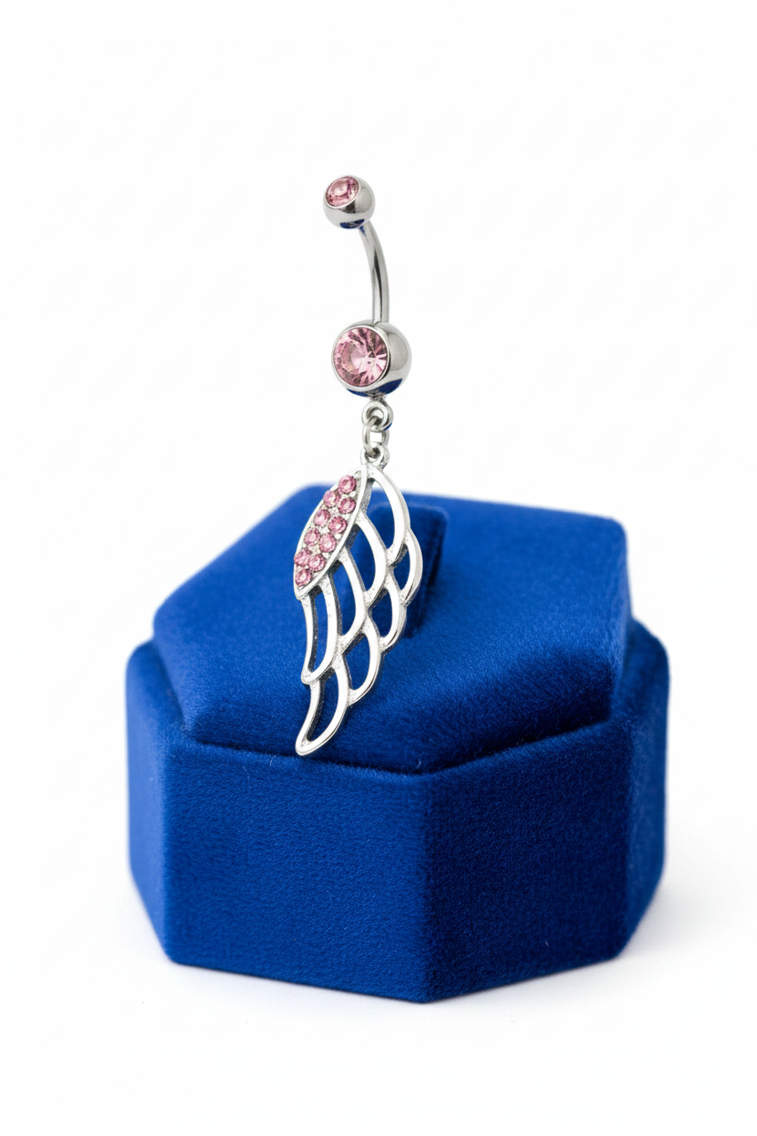 Pink Crystal Wing Belly Button Ring in 316l stainless steel on a blue velvet jewelry display.