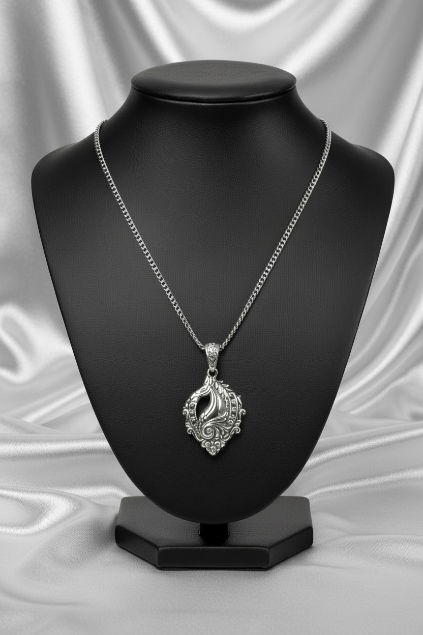 Horse Head Steel Chain Necklace in 316l stainless steel on a black bust.