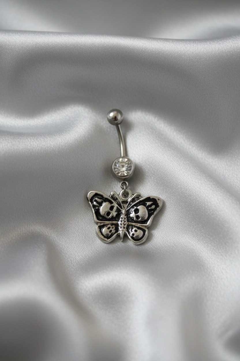 Clear Crystal Skull Butterfly Belly Button Ring in 316l stainless steel.