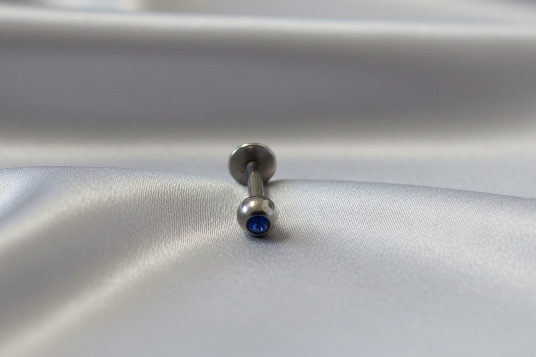 Navy Blue Crystal Labret Lip Ring in 316l stainless steel.