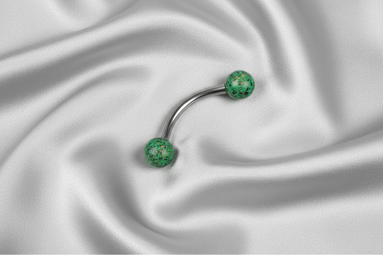 Green Black and Gold Speckled Acrylic Eyebrow Ring in 316l stainless steel.