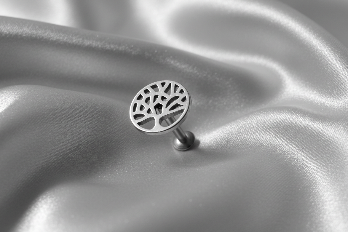 Internally Threaded Tree of Life Labret Lip Ring in 316l stainless steel.