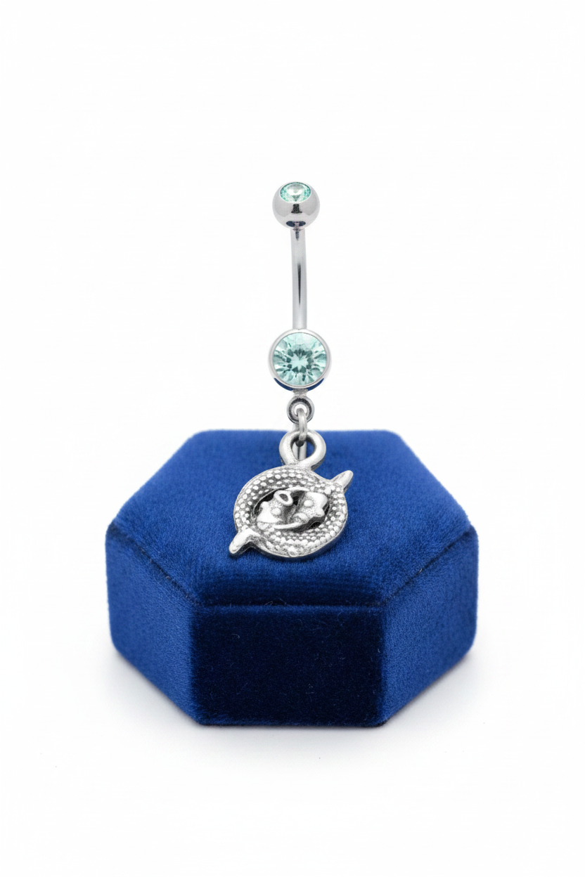 Aqua Crystal Pisces Belly Button Ring in 316l stainless steel on a blue velvet jewelry display