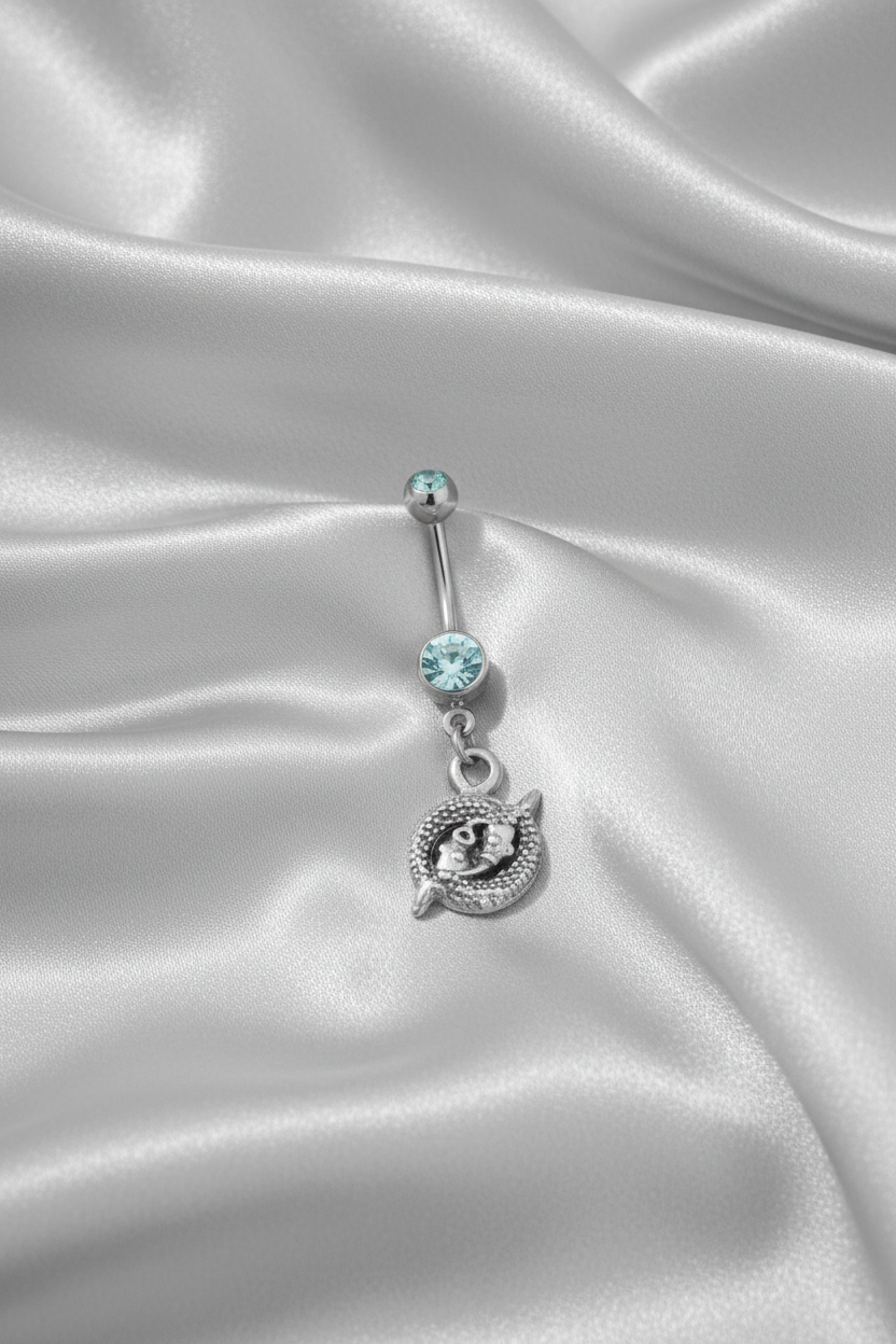 Aqua Crystal Pisces Belly Button Ring in 316l stainless steel.