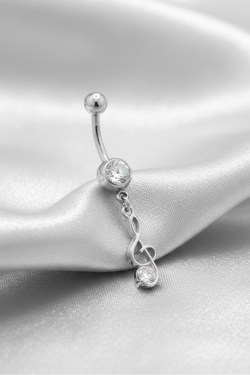 Clear Crystal Treble Clef Belly Button Ring in 316l stainless steel.