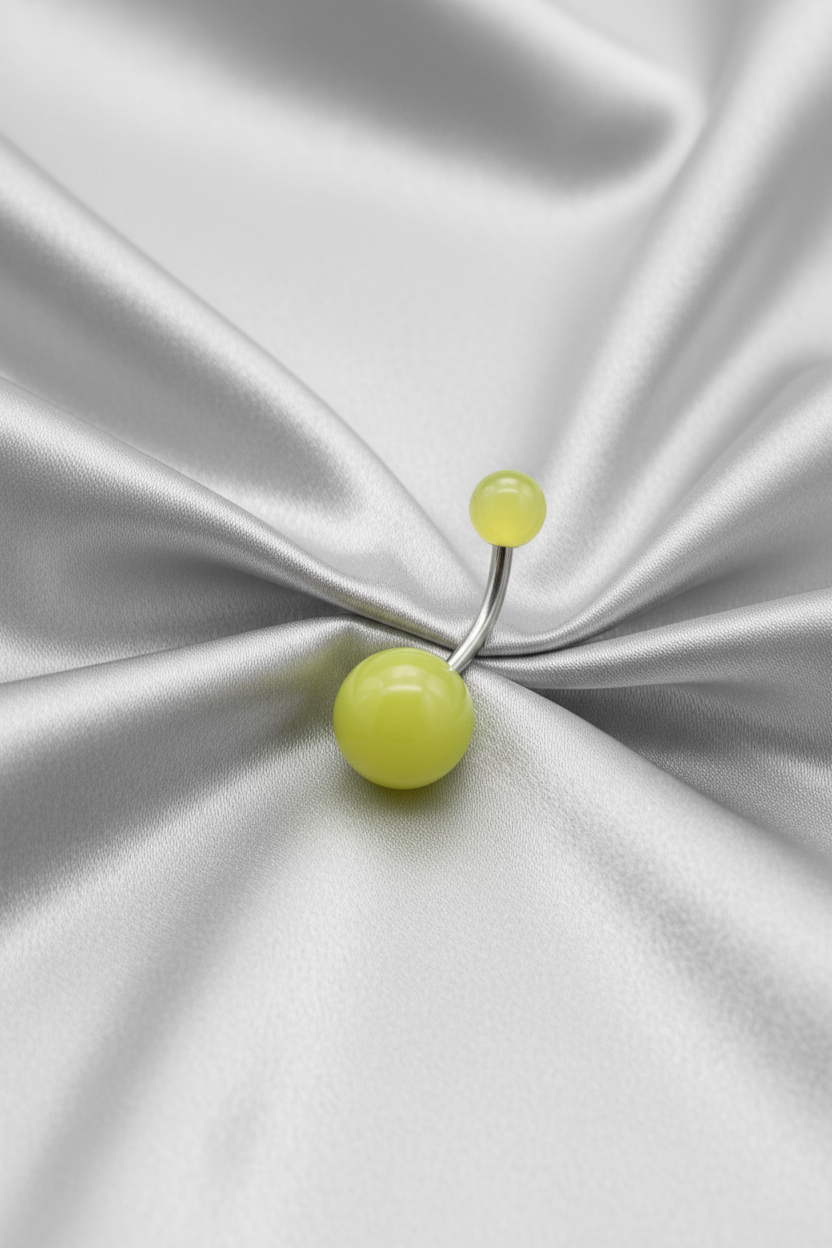 Yellow Glow acrylic belly button ring in 316l stainless steel