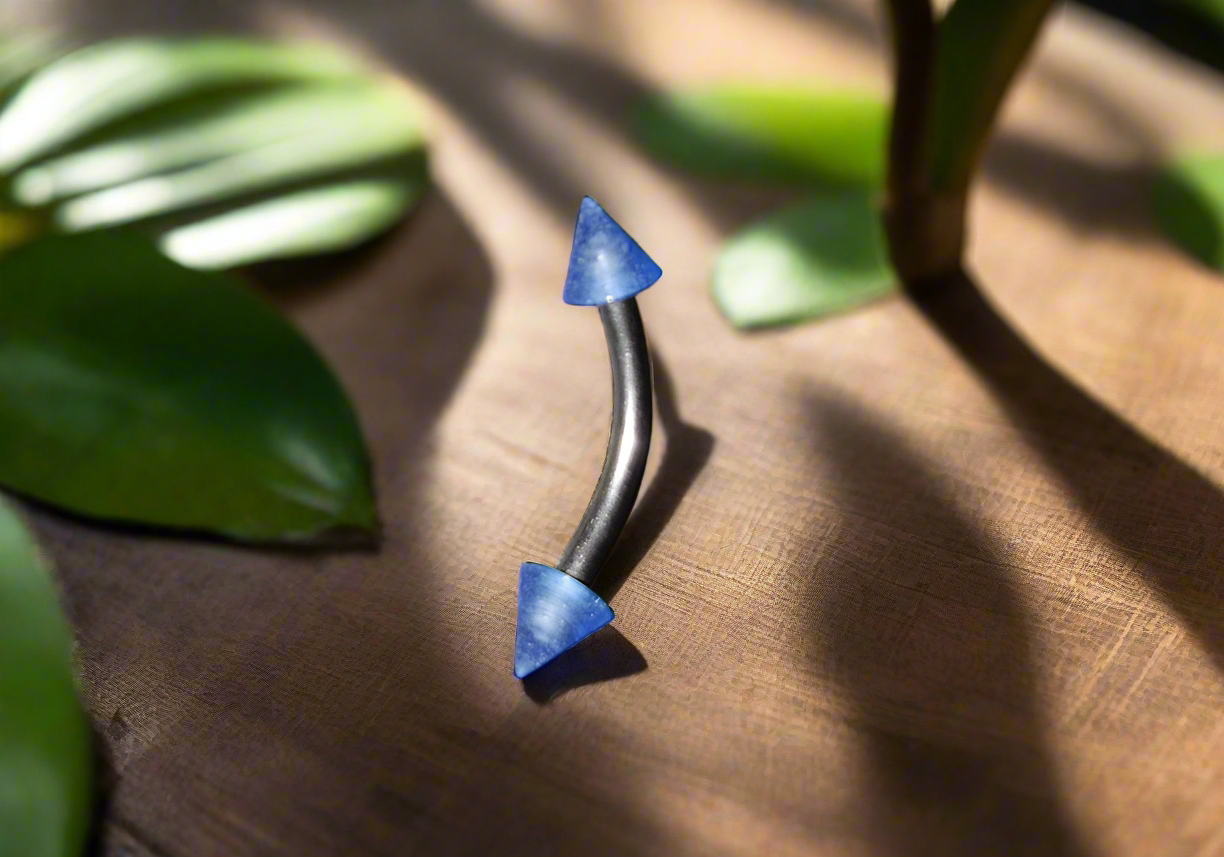 Steel Eye Brow Piercing with Blue Glow Acrylic Spikes