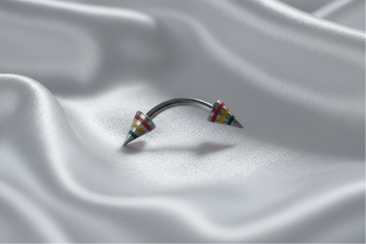 Multicolor Striped Spike Eyebrow Ring in 316l stainless steel.