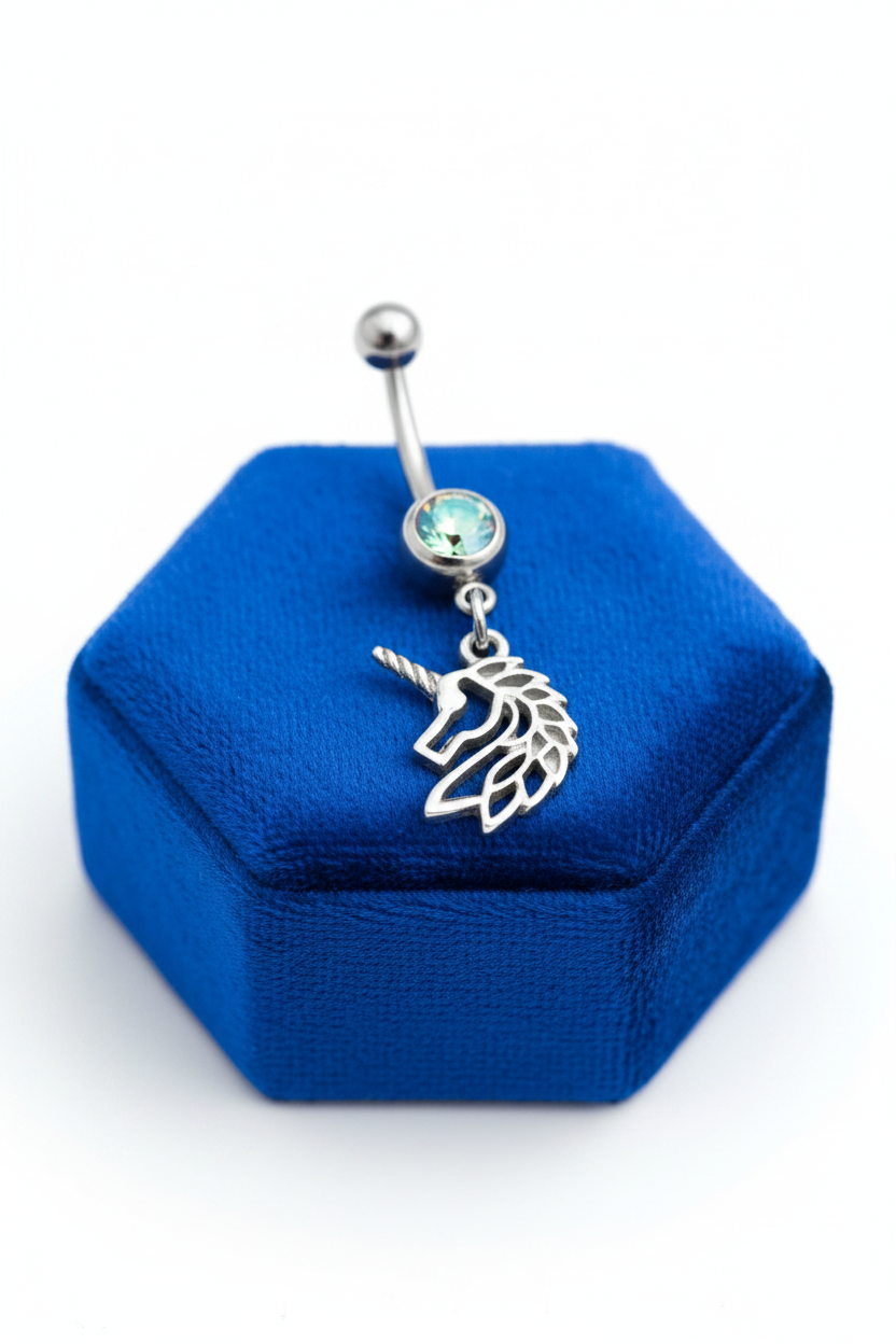 Aurora Crystal Unicorn Belly Button Ring in 316l stainless steel on a blue velvet jewelry display.