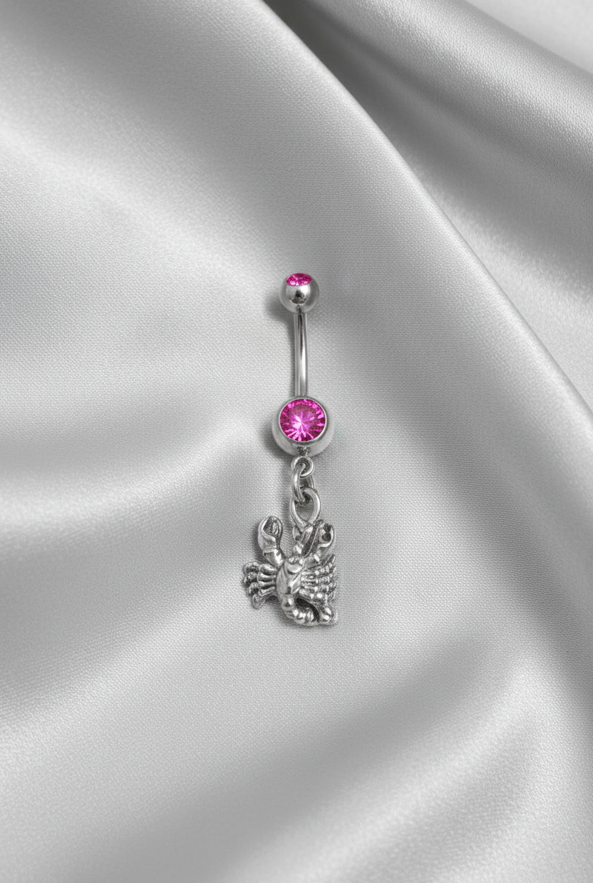 Pink Crystal Scorpio Belly Button Ring in 316l stainless steel.