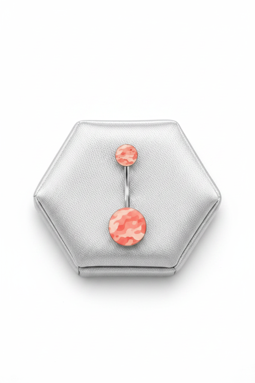 Pink Camouflage Acrylic Belly Button Ring in 316l stainless steel on a silver jewelry display.