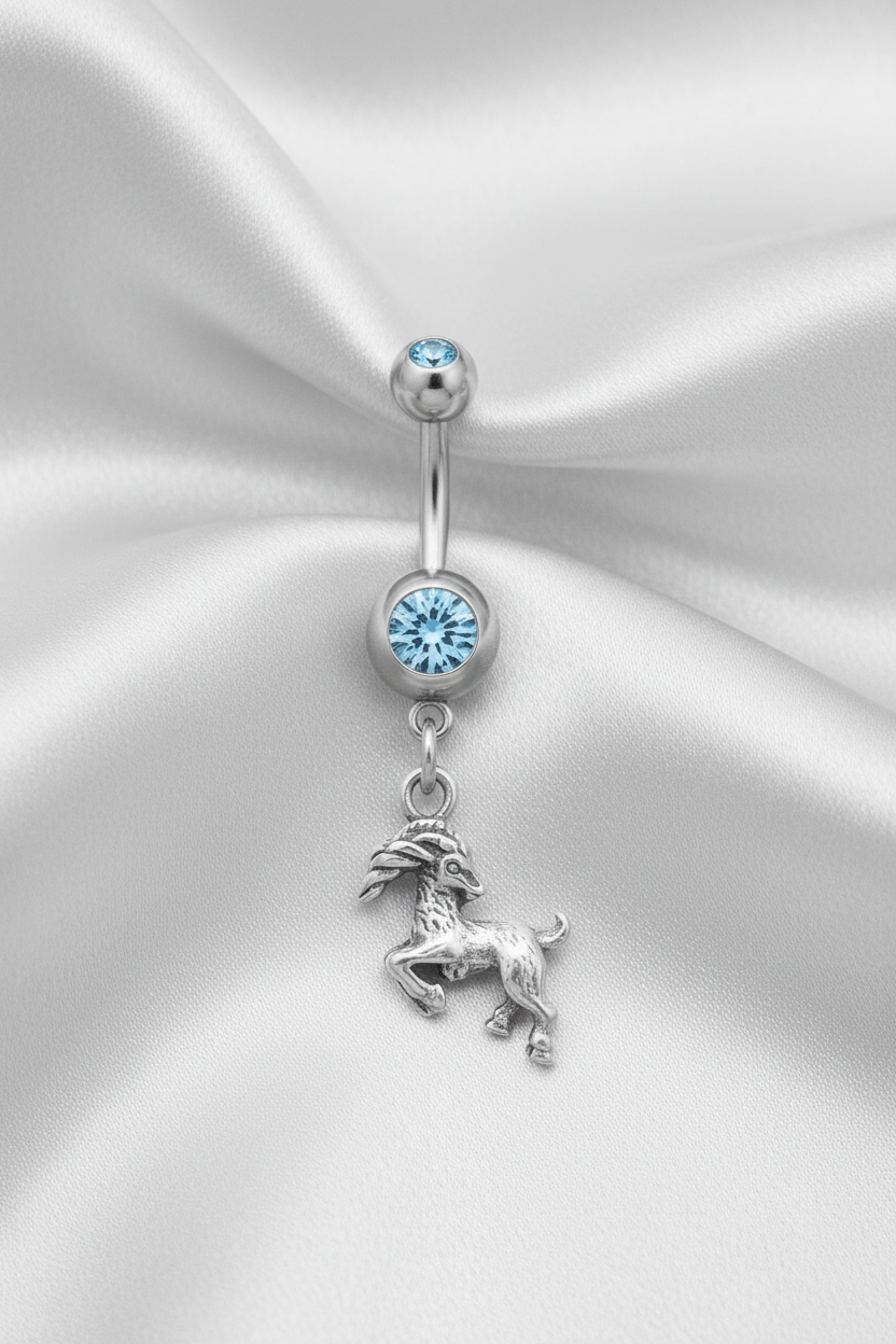 Blue Crystal Capricorn Belly Button Ring in 316l stainless steel.
