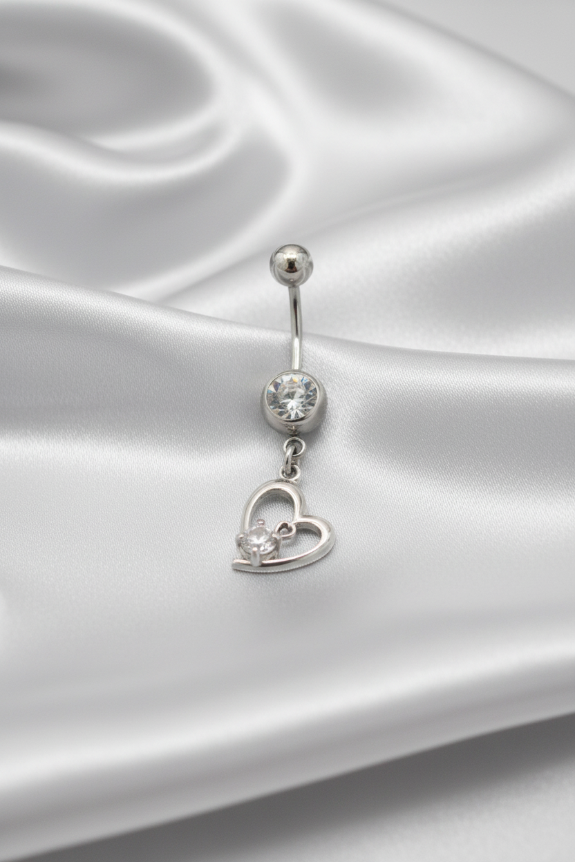 Clear Crystal Heart Belly Button Ring in 316l stainless steel.