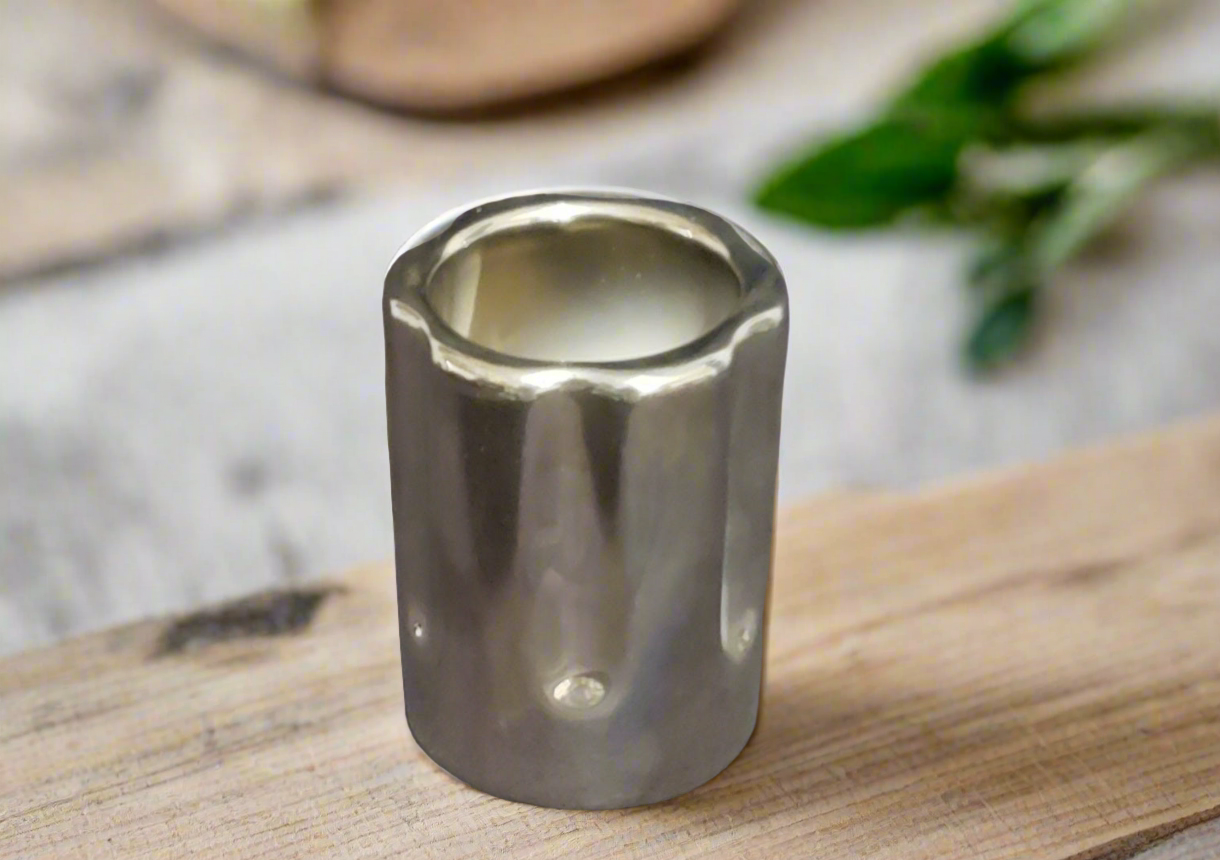 Silver Revolver Style Shot Glasses.