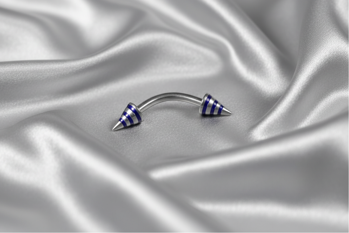 Blue Striped Steel Spike Eyebrow Ring in 316l stainless steel.