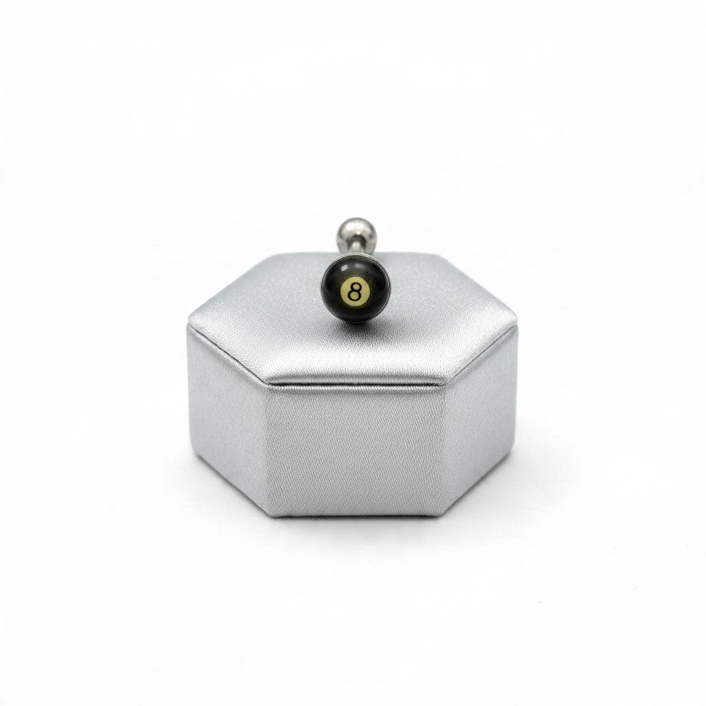 8 Ball Tongue Barbell in 316l stainless steel on a silver silk jewelry display