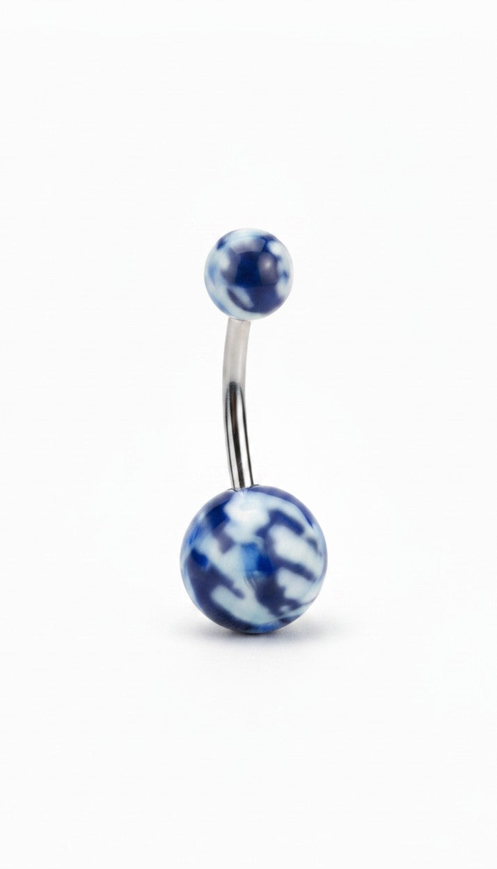 Blue Camouflage Acrylic Belly Button Ring in 316l stainless steel on a white background.