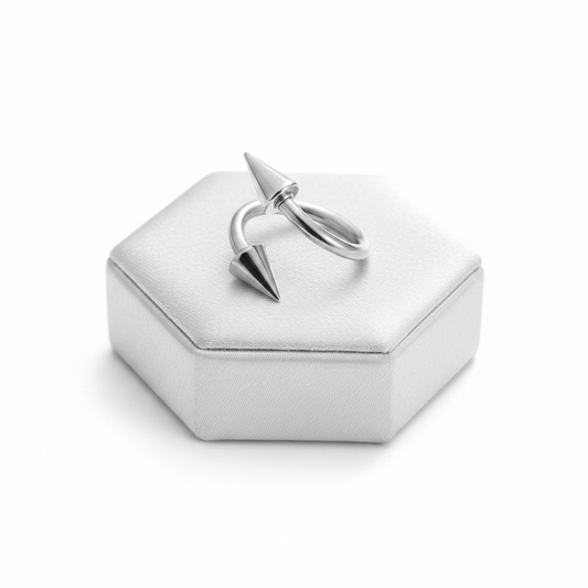 Steel Spike Curled Barbell in 316l stainless steel on a silver silk jewelry display.