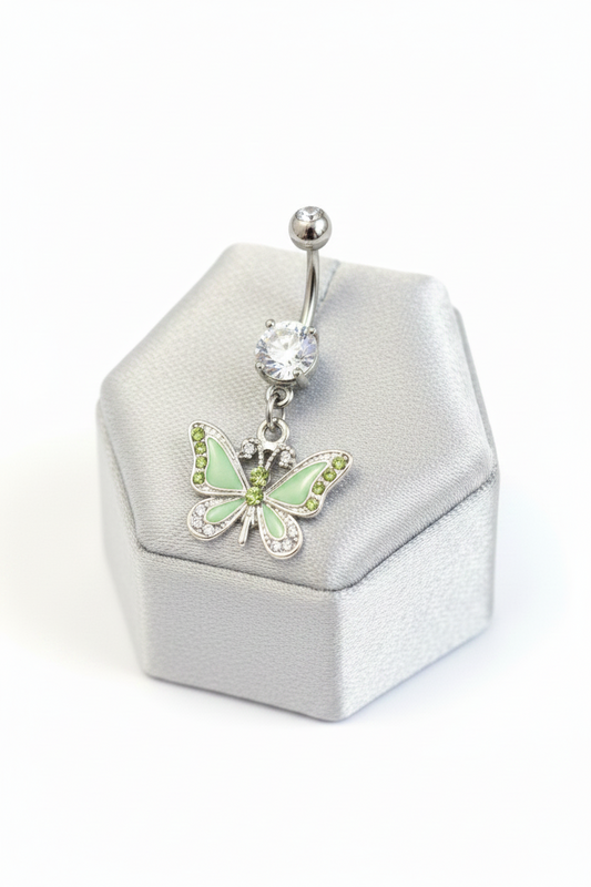Green Enamel Butterfly Belly Button Ring in 316l stainless steel on a silver silk jewelry display.