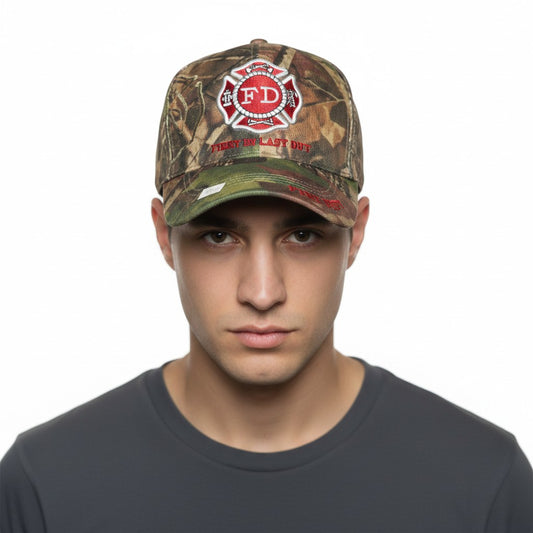 First In Last Out - Fire Department Logo Adjustable Camouflage Baseball Cap with a white background on a male model front profile.