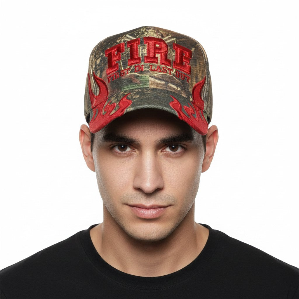 First In Last Out Fire and Flames Firefighter Adjustable Camouflage Baseball Cap with a white background on a male model front profile.