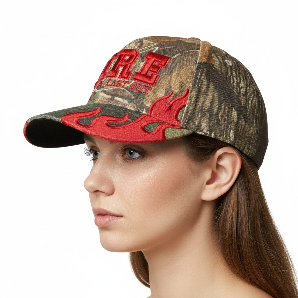 First In Last Out Fire and Flames Firefighter Adjustable Camouflage Baseball Cap with a white background on a female model side profile.