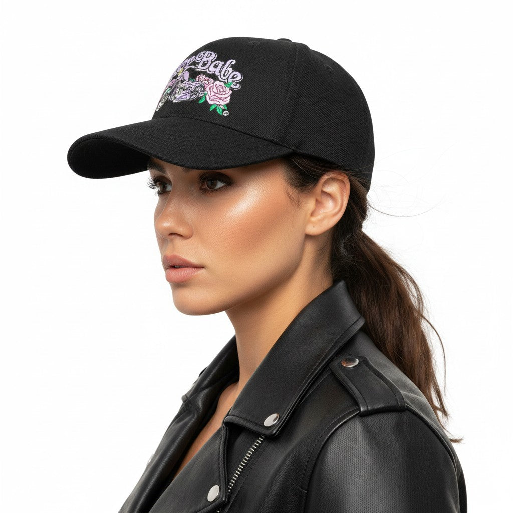 Floral Biker Babe Adjustable Black Baseball Cap with a white background on a female model side profile.