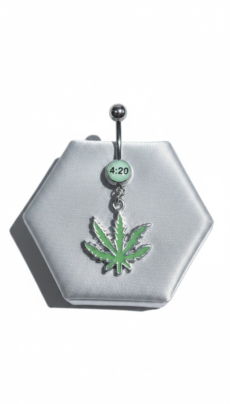 420 Green Leaf Belly Button Ring in 316l stainless steel on a silver jewelry display.