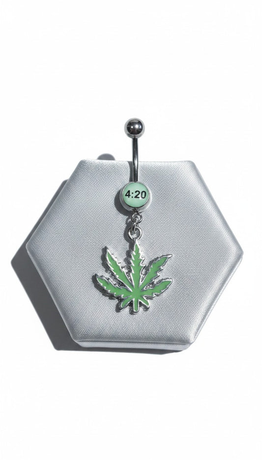 420 Green Leaf Belly Button Ring in 316l stainless steel on a silver jewelry display.