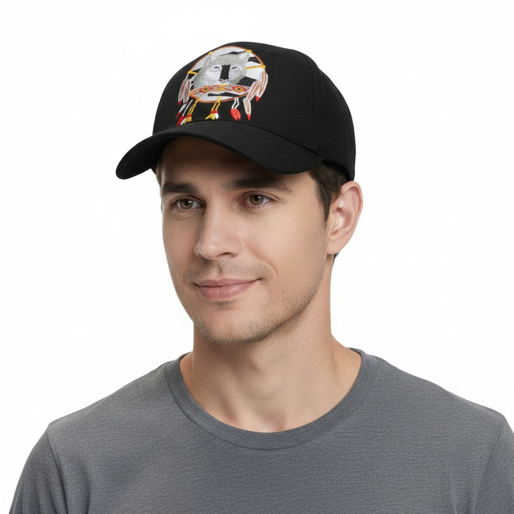 Grey Wolf with Dreamcatcher Adjustable Black Baseball Cap with a white background on a male model front profile.