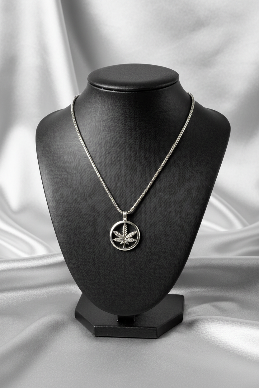 Green Leaf Steel Chain Necklace in 316l stainless steel on a black bust.
