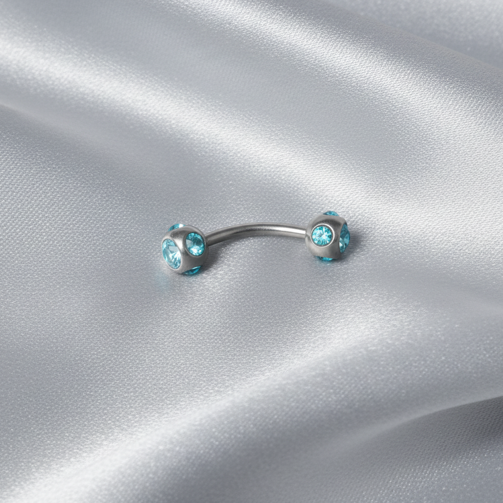 Aqua Multi-Crystal Eyebrow Ring in 316l stainless steel.