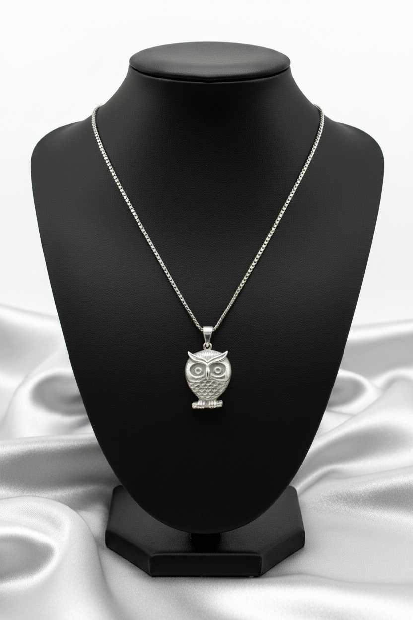 Perched Owl Steel Chain Necklace in 316l stainless steel on a black bust.