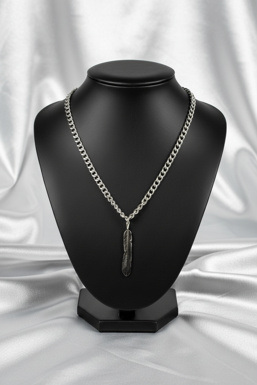 Feather Steel Chain Necklace in 316l stainless steel on a black bust.