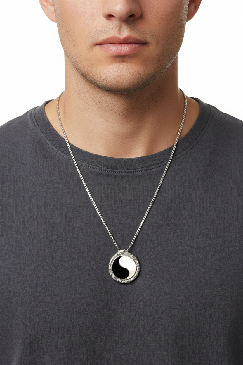 Serpentine Yin Yang Steel Chain Necklace in 316l stainless steel on a male model.