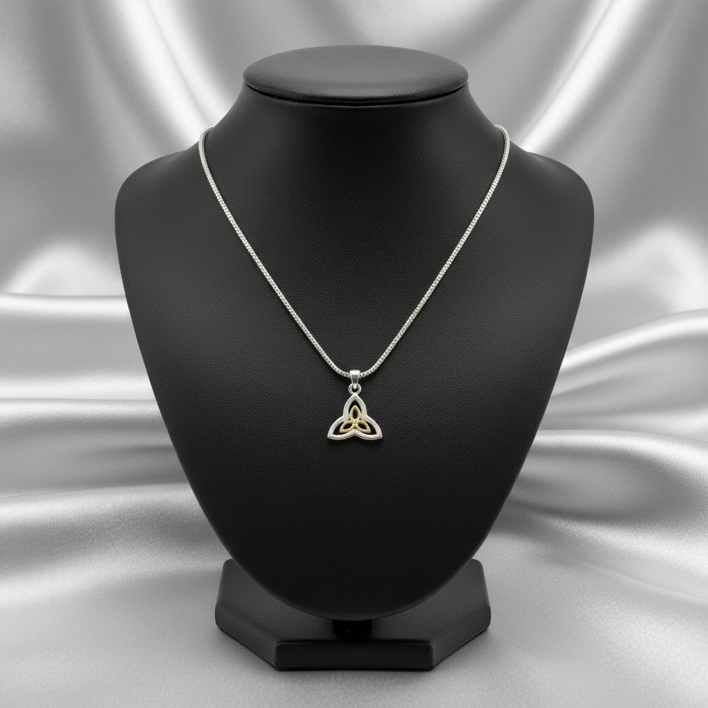 Gold Plated Triquetra Steel Chain Necklace in 316l stainless steel on a black bust.
