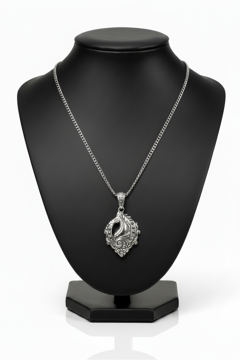 Horse Head Steel Chain Necklace in 316l stainless steel on a black bust with a white background.