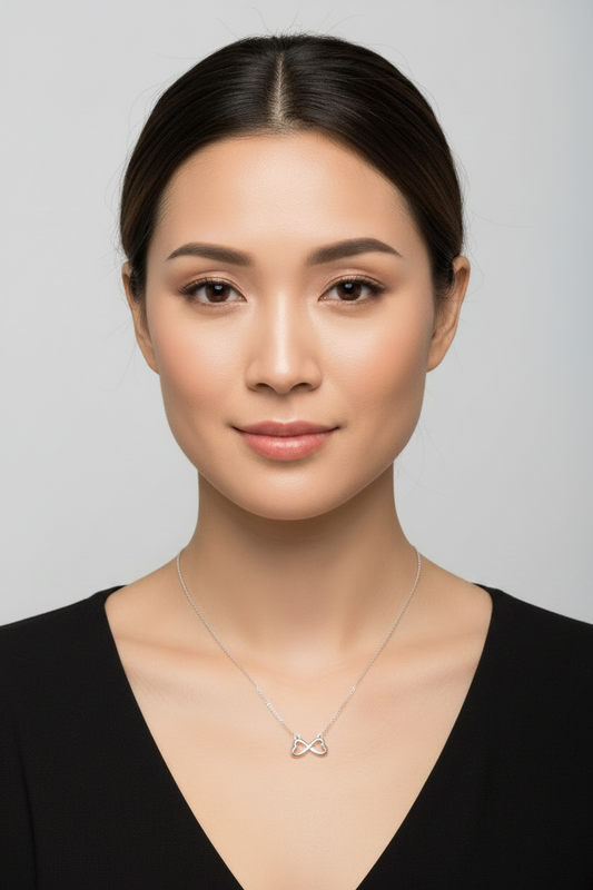 Infinity Hearts Steel Chain Necklace in 316l stainless steel on a female model.