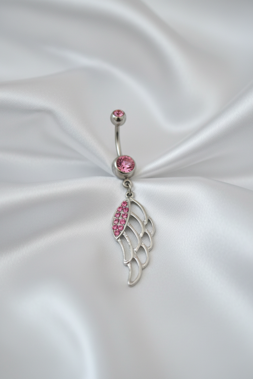 Pink Crystal Wing Belly Button Ring in 316l stainless steel.