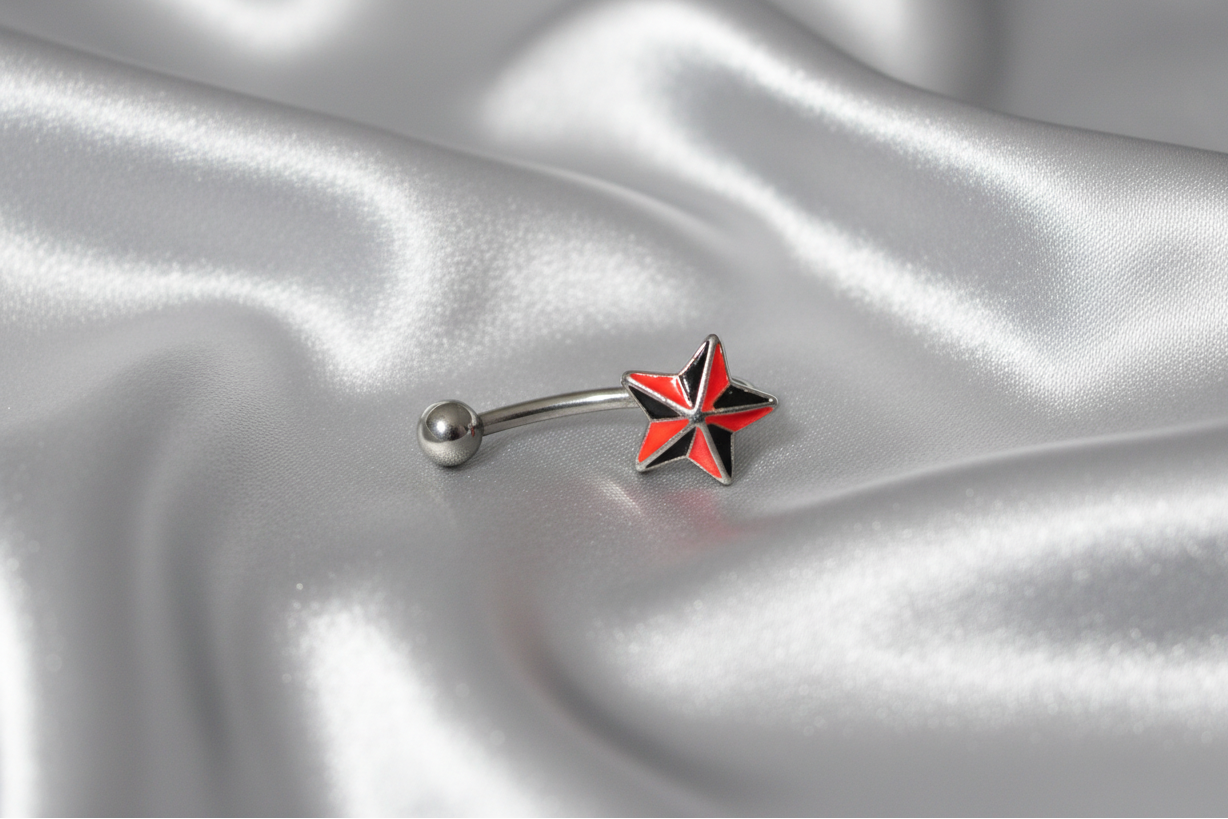Red and Black Star Eyebrow Ring in 316l stainless steel.