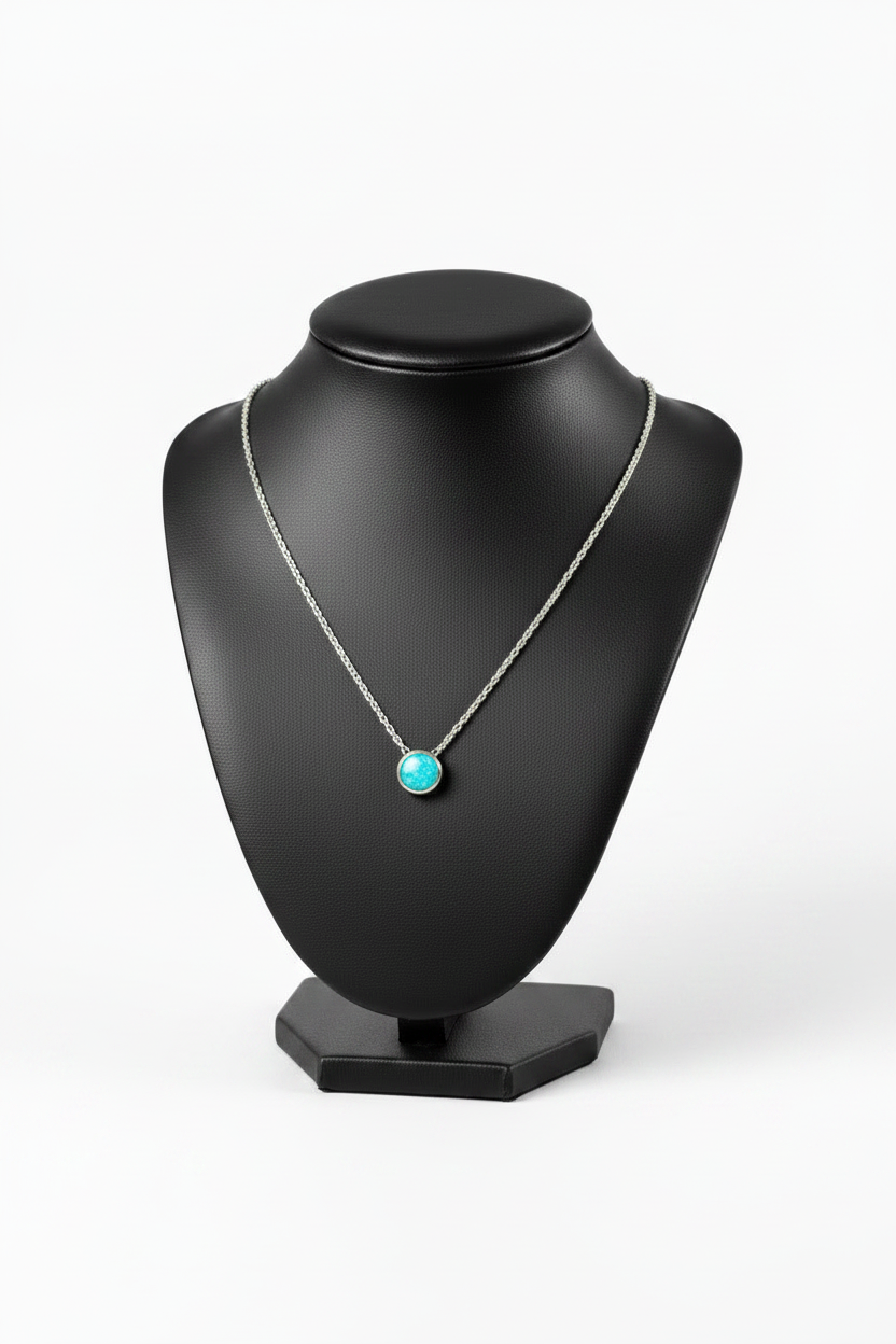 Aqua Opal Steel Chain Necklace in 316l stainless steel on a black bust with a white background.