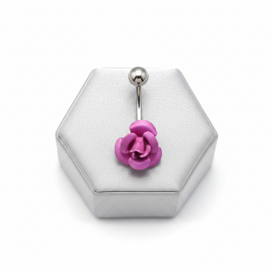 Purple Rose Belly Button Ring in 316l stainless steel on a silver jewelry display.