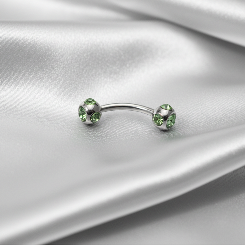 Green Multi-Crystal Eyebrow Ring in 316l stainless steel.