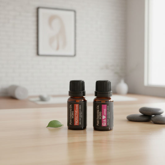 Love & Protection Essential Oil Blends 2 Pack Special on a wooden surface in a yoga studio.
