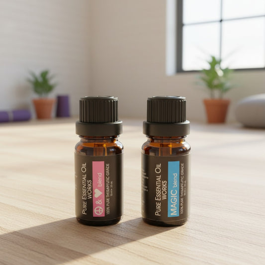 Magical Peace & Love Essential Oil Blends 2 Pack Special on a wooden surface in a yoga studio.