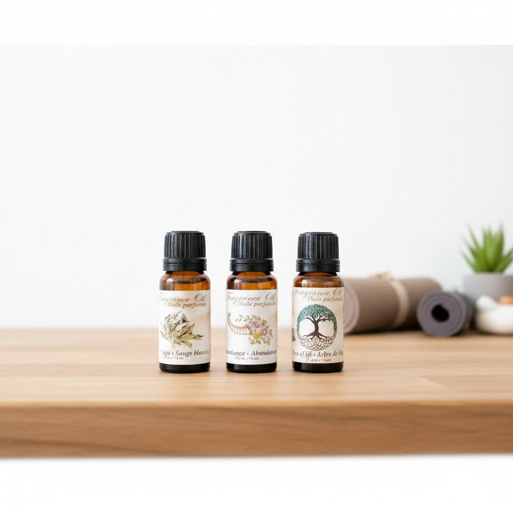 Natural Abundance Essential Oil Blends 3 Pack Special on a wooden counter in a yoga studio.