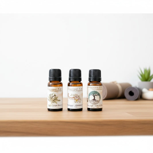 Natural Abundance Essential Oil Blends 3 Pack Special on a wooden counter in a yoga studio.