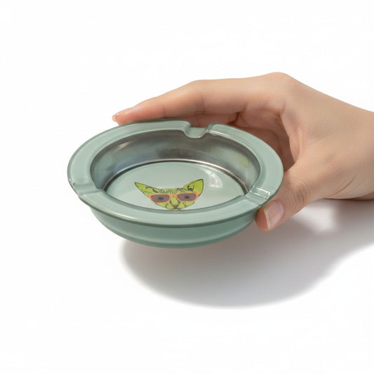Neon Green Cool Cat with Sunglasses 3 Inch Glass Ashtray being held in a models hand showing full cat design detail.