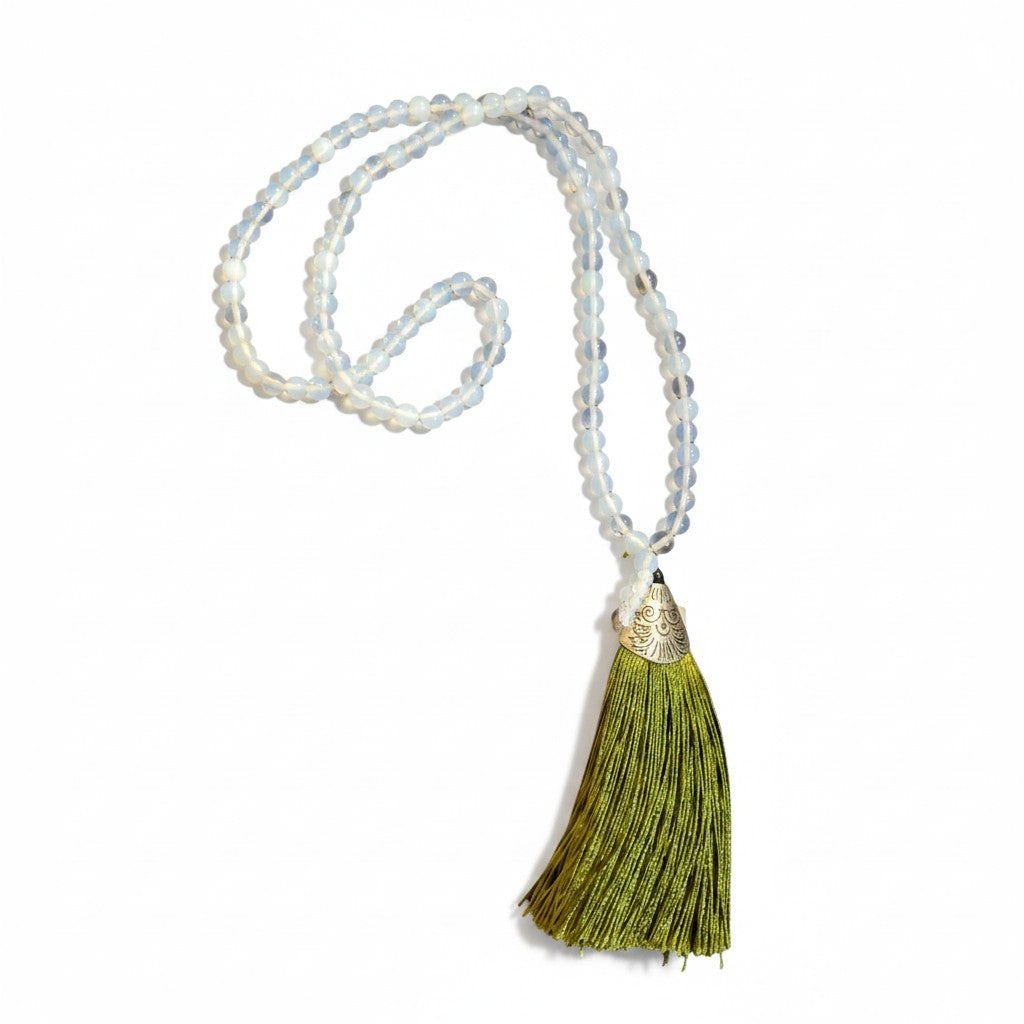 Opalite Bead Mala with Green Silk Tassel on a white background showing bead and tassel detail.