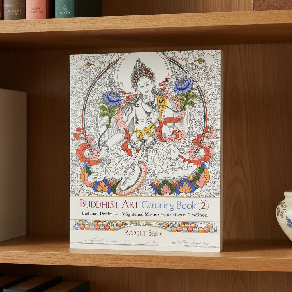 Oriental Sacred Buddha Mentally Relaxing Adult Coloring Book on a bookshelf showing front cover artwork detail.